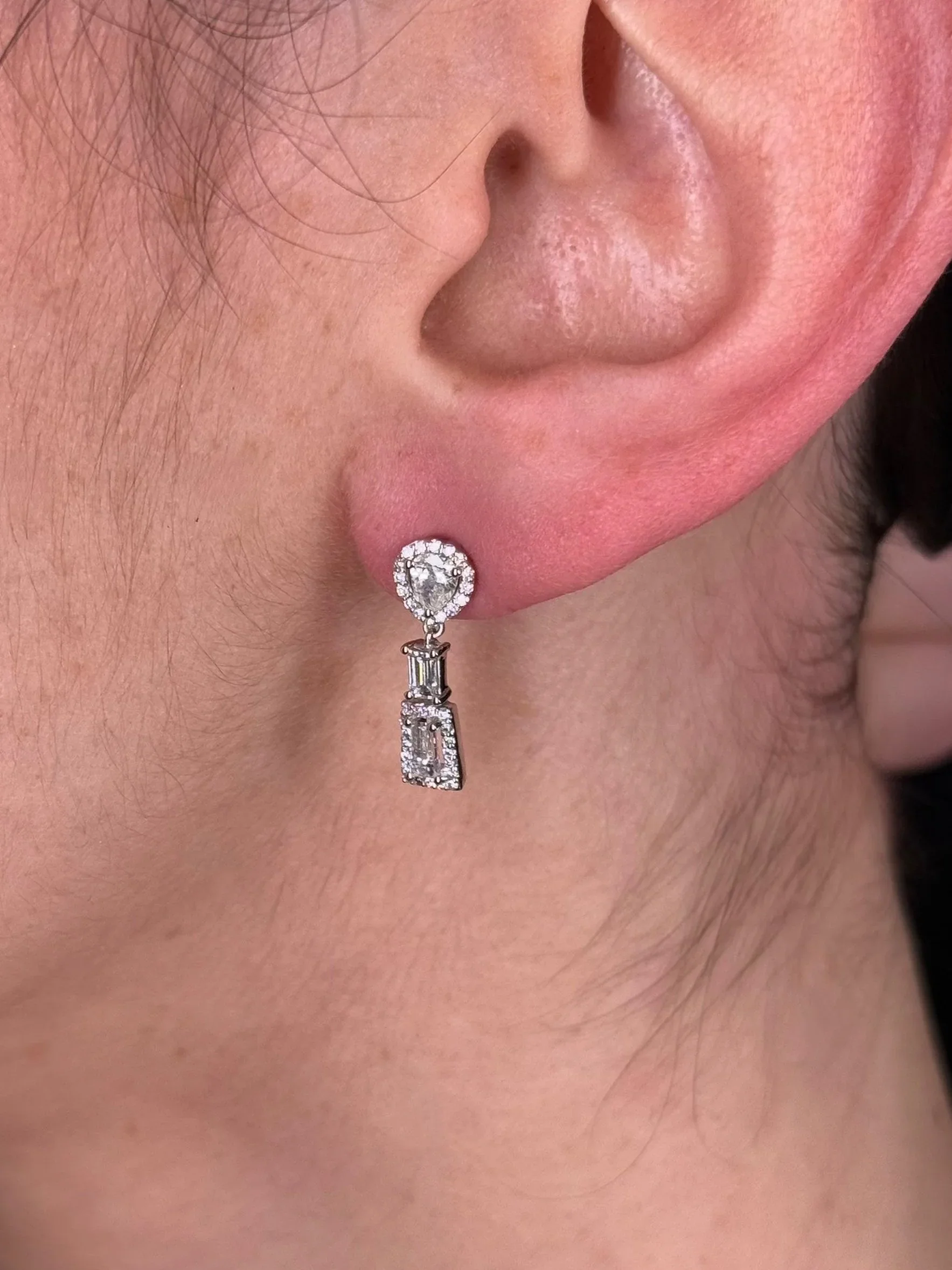 Ladies Round, Pear, and Baguette Diamond Dangle Earrings